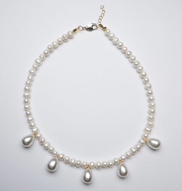 Necklace made of natural pearls with inserts