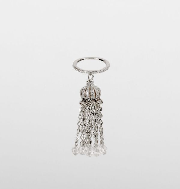 Ring with tassel on a thin base