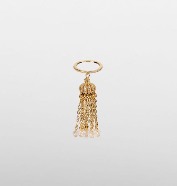 Ring with tassel on a thin base